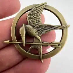 Mockingjay The Hunger Games Round Bird Arrow Pin Brass Tone Lapel Brooch