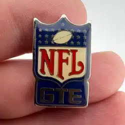 VINTAGE 1985 NFL FOOTBALL GTE FOOTBALL SHIELD COLLECTIBLE ENAMEL PIN