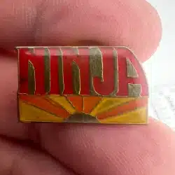 1988 AGB Ninja Sunrise Lapel Hat Pin - Used