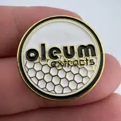 Oleum Extracts Lapel Pin - Gold Tone - Used