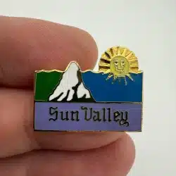 Vintage Sun Valley Idaho Ski Skiing Travel Lapel Hat Pin with Golden Sun on top