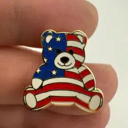 Patriotic Teddy Bear Enamel Pin with Red White and Blue Flag Overlay