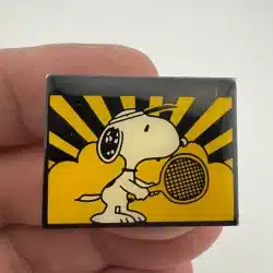Snoopy Playing Tennis Lapel Pin - UFS INC / 1958 Stamped *scratch/scuff marks*