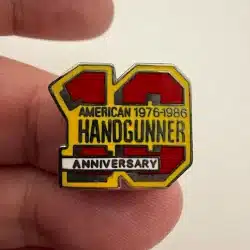 American Handgunner Magazine 10th Anniversary Pin - 1976-1986