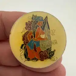 100% CHICANA Lapel Hat Pin *yellowed*