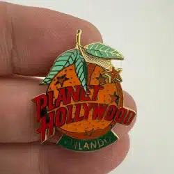 Planet Hollywood Orlando Florida Orange Lapel Pin *corrosion on rear*
