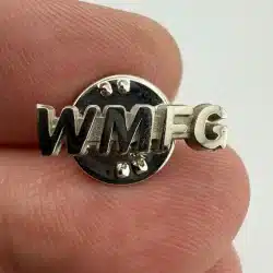 WMFG Pin - Possibly 1240 AM Radio Station from Minnesota *slightly curved pin*