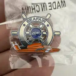 2010 Seafair Lapel Hat Pin - Captain's Wheel and Orange Hydroplane