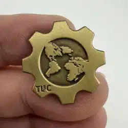 Unknown TL3C Cog Globe Lapel Hat Pin