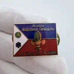 Vintage Acadian Ambulance Service, Inc. Flag Lapel Pin