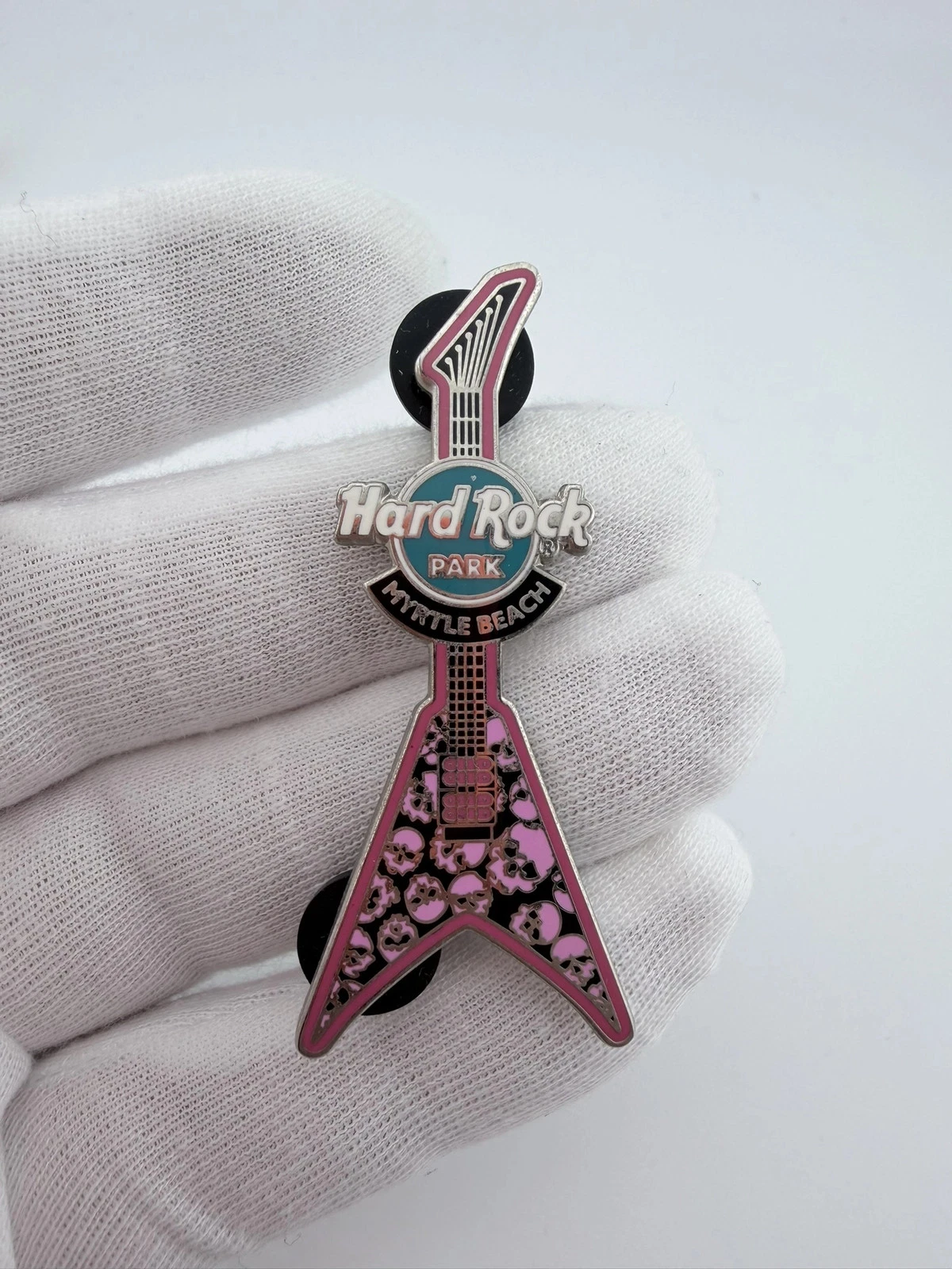 Hard Rock Park Myrtle Beach Flying V Guitar Pin - Pink Skulls