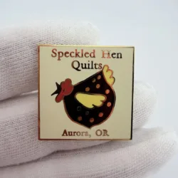 Speckled Hen Quilts Aurora Oregon Lapel Pin - Yellowing?