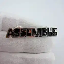 tripleS ASSEMBLE '25 Lapel Hat Pin - Dual Clasp